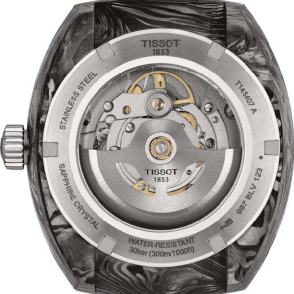 Die Rückseite der Tissot Sideral-Uhr zeigt ihr komplexes Automatikwerk. Das Edelstahlgehäuse ist rund um den sichtbaren Mechanismus mit den Gravuren „Edelstahl“, „Saphirglas“ und „Wasserdicht bis 30 bar“ versehen.