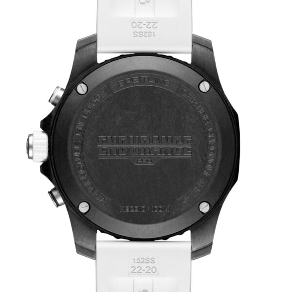 Das Bild zeigt die Rückseite einer Breitling Endurance Pro-Uhr in Schwarz mit eingraviertem Text am Rand und einem zentrierten Logo sowie einem daran befestigten weißen Armband.
