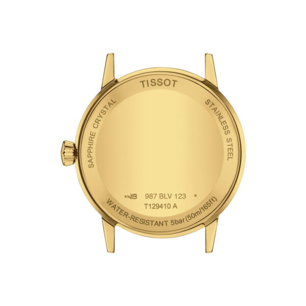Nahaufnahme des Gehäusebodens einer Tissot Classic Dream aus Gold mit Gravuren: „Tissot“ oben, „Sapphire Crystal“ und „Stainless Steel“ an den Seiten. Unten sind die Modellnummer 987 BLV 123 und eine Wasserdichtigkeit von 5 bar/50 m/165 ft vermerkt. Die Krone ist links sichtbar.