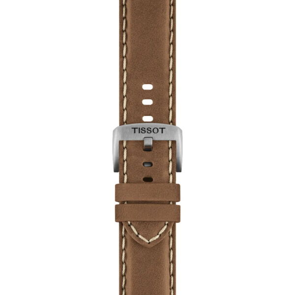 Die Tissot Chrono L 42MM verfügt über ein braunes Lederarmband mit weißen Nähten, einer silbernen TISSOT-Gravur, mehreren Verstelllöchern und zwei Schlaufen zur Befestigung des Bandendes.