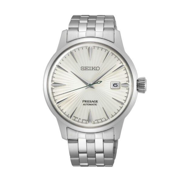 Die Seiko Presage Cocktail SRPG23J1 ist eine automatische Armbanduhr mit einem silbernen Metallband, einem strukturierten weißen Zifferblatt, silbernen Stundenmarkierungen und einem Datumsfenster bei 3 Uhr, alles in einem klassischen und eleganten Design.