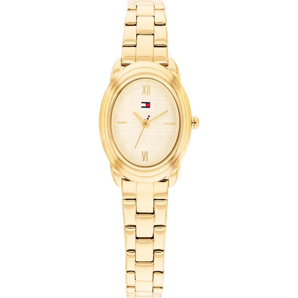 Tommy Hilfiger Demi Armbanduhr in Goldoptik mit ovalem Zifferblatt, minimalistischem Design mit römischen Ziffern bei 6 und 12 Uhr sowie einem kleinen rot-weiß-blauen Tommy Hilfiger-Logo unterhalb der 12-Uhr-Position. Sowohl das Armband als auch das Gehäuse sind aus goldfarbenem Metall gefertigt.