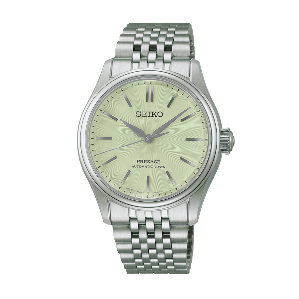 Eine silberfarbene Seiko Presage Classic Automatik-Armbanduhr mit hellgrünem Zifferblatt, silbernen Indexen und Zeigern sowie einem Metallgliederarmband, abgebildet vor weißem Hintergrund.